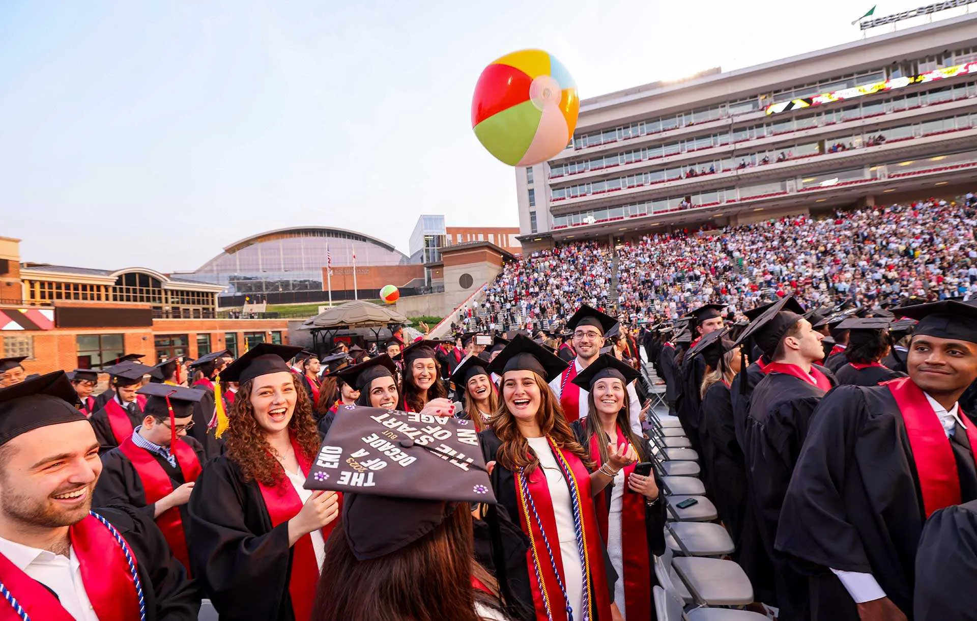 grads bounce beach balls