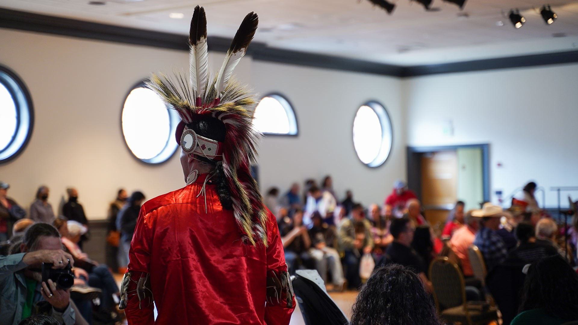 Native American wearing headdress
