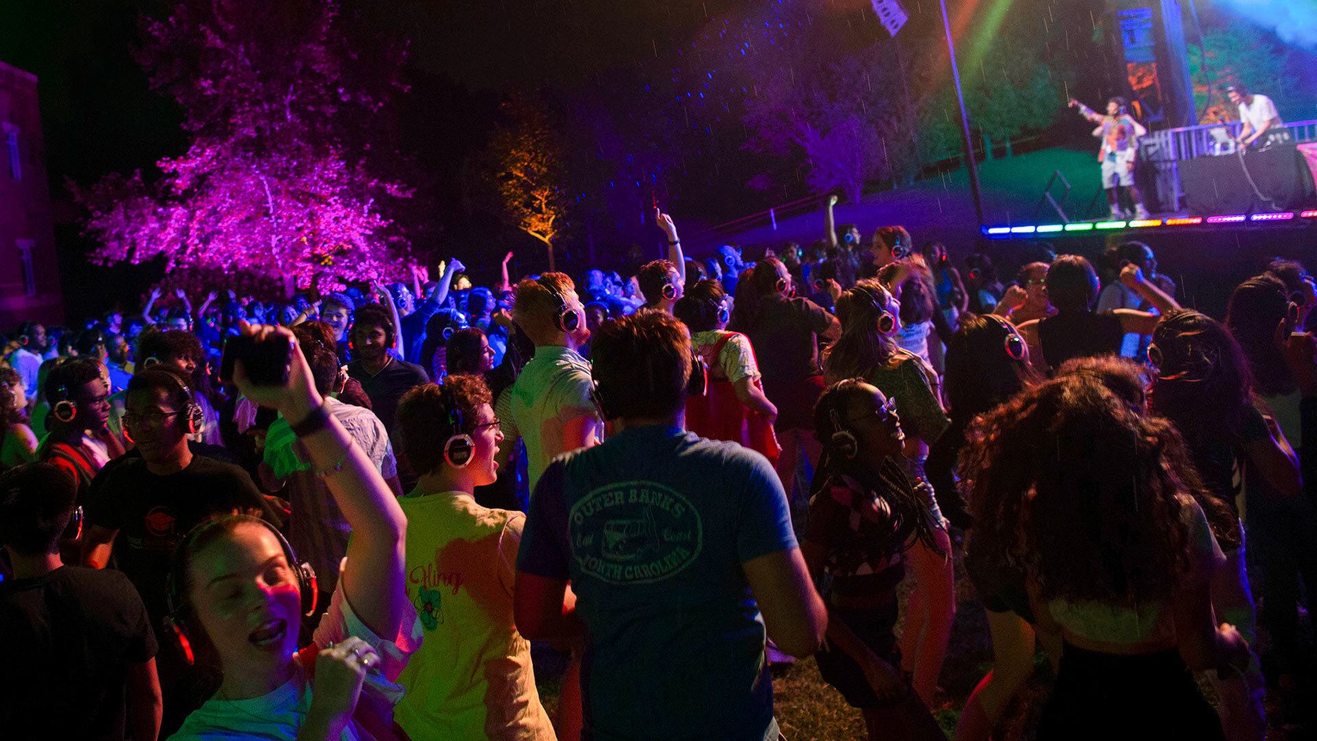 students dancing in the dark