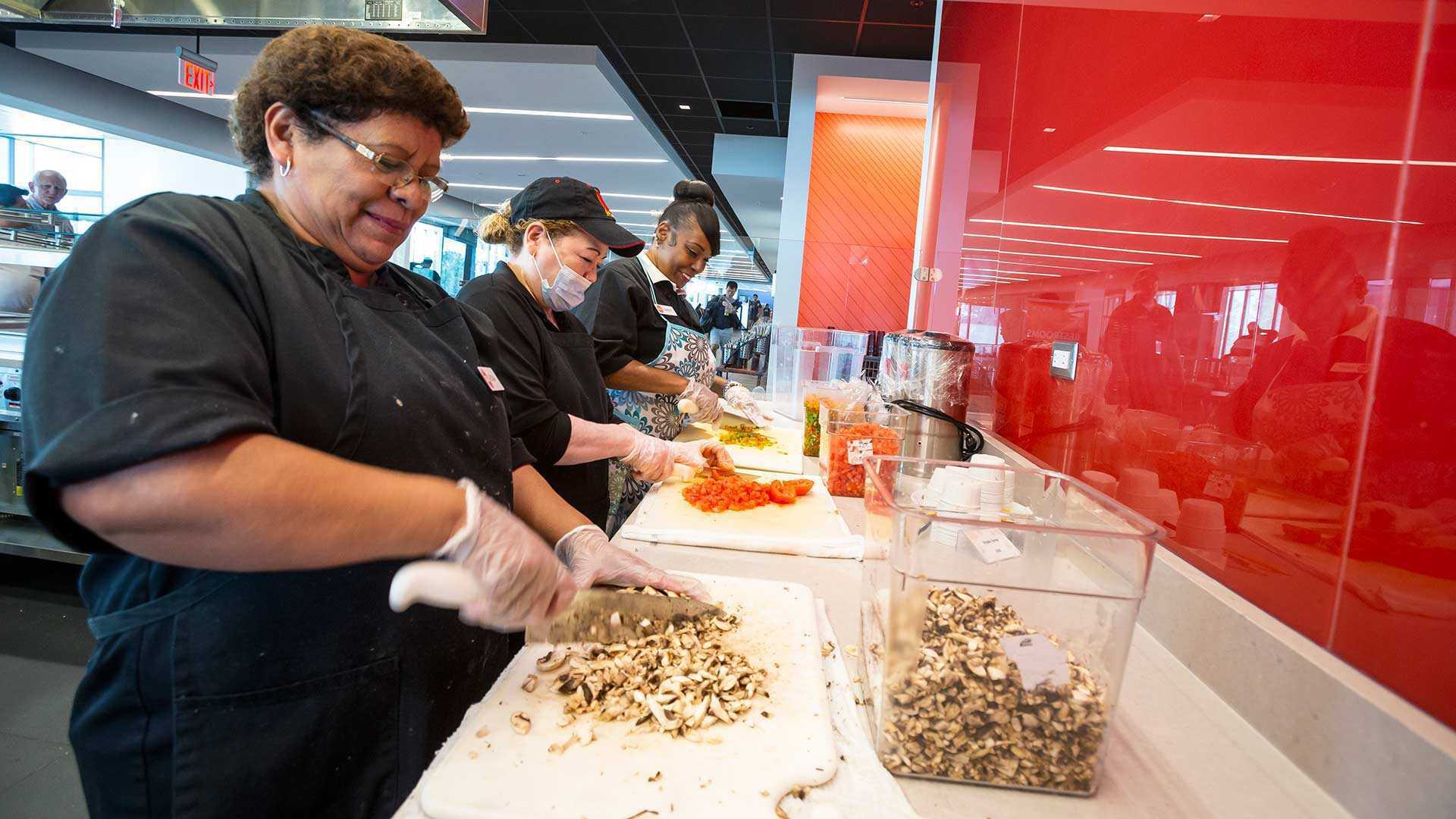 Dining Services staff chops veggies