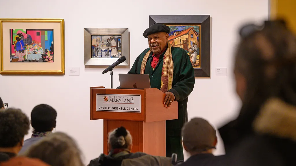 man speaks at podium