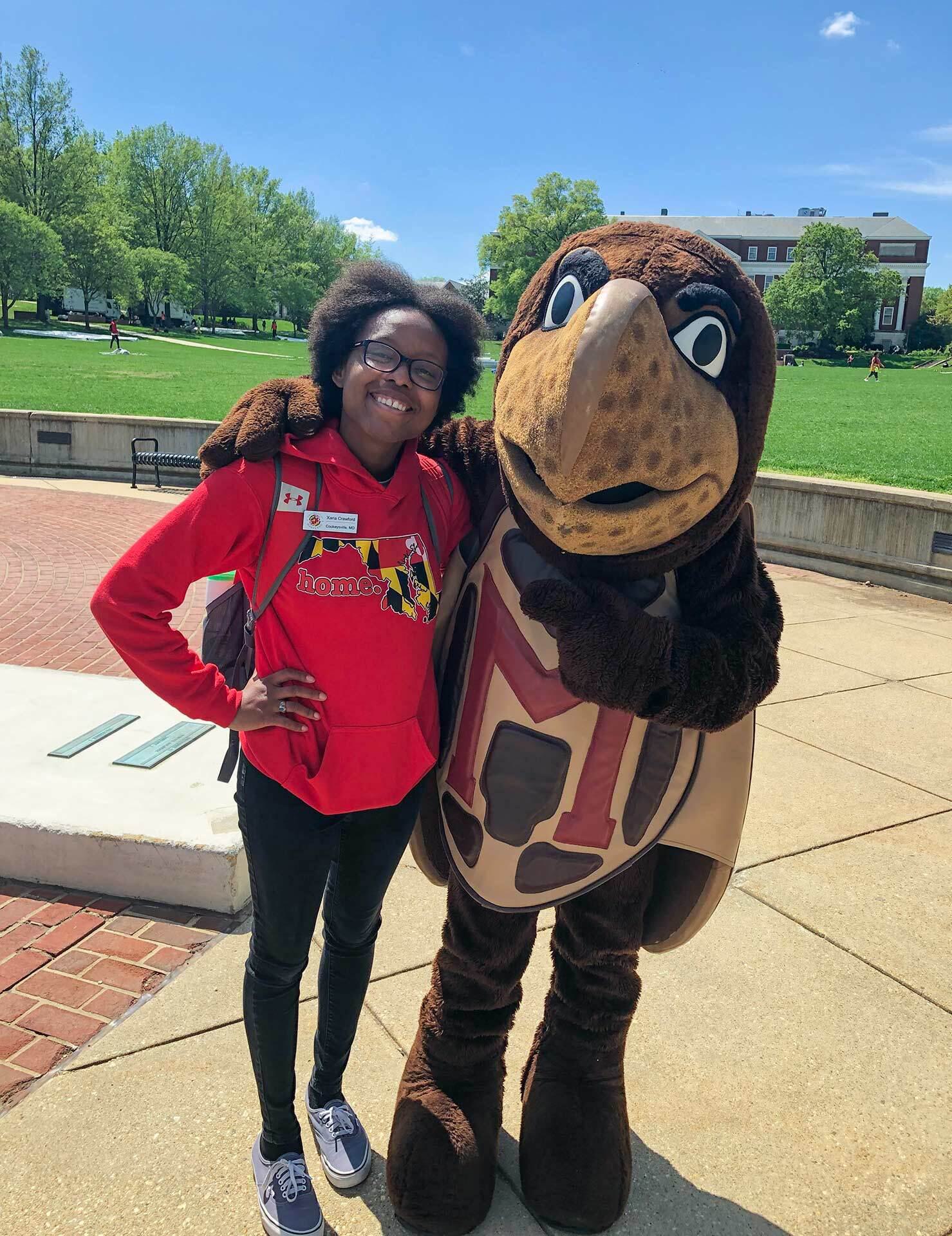 Xaria Duvall and Testudo the mascot