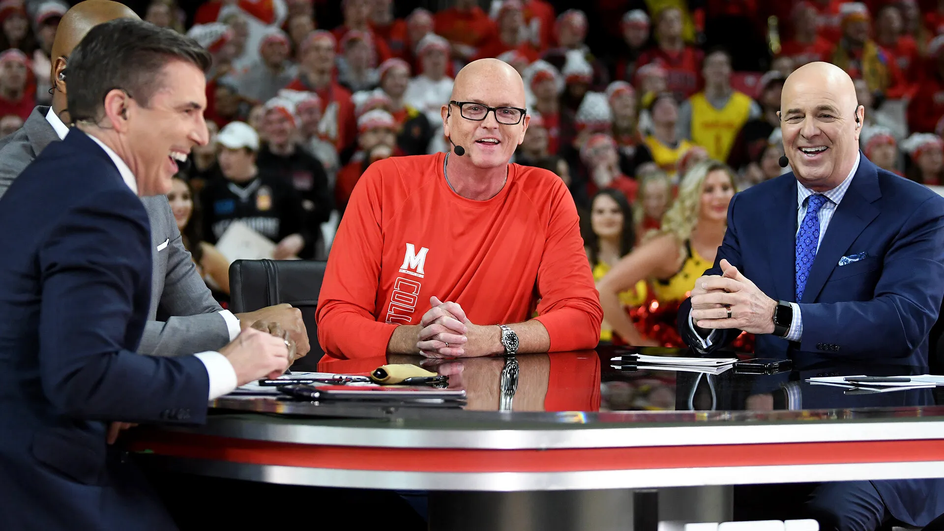Scott Van Pelt, center, with other ESPN broadcasters at a game