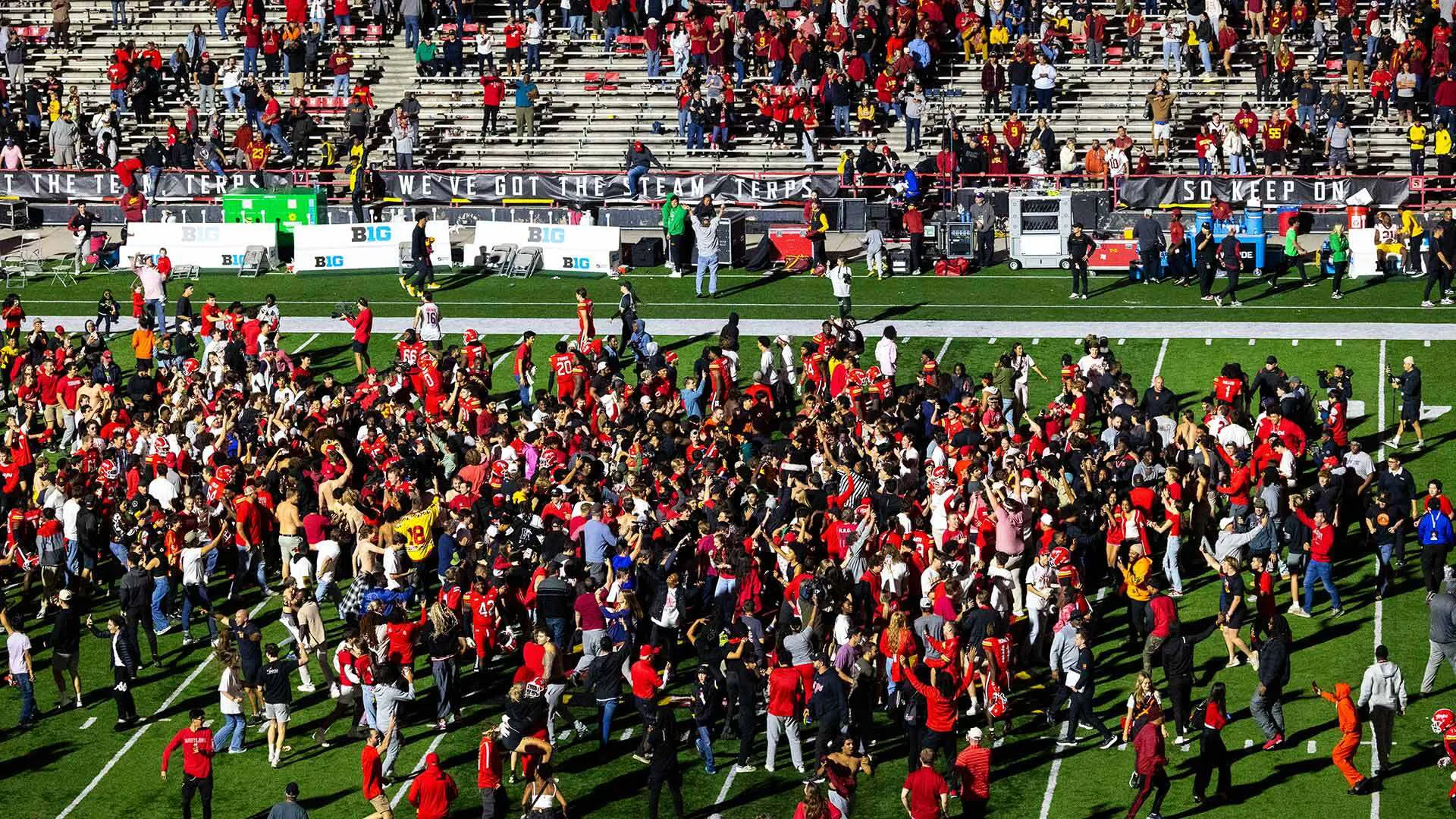 Maryland fans storm the field at SECU Stadium