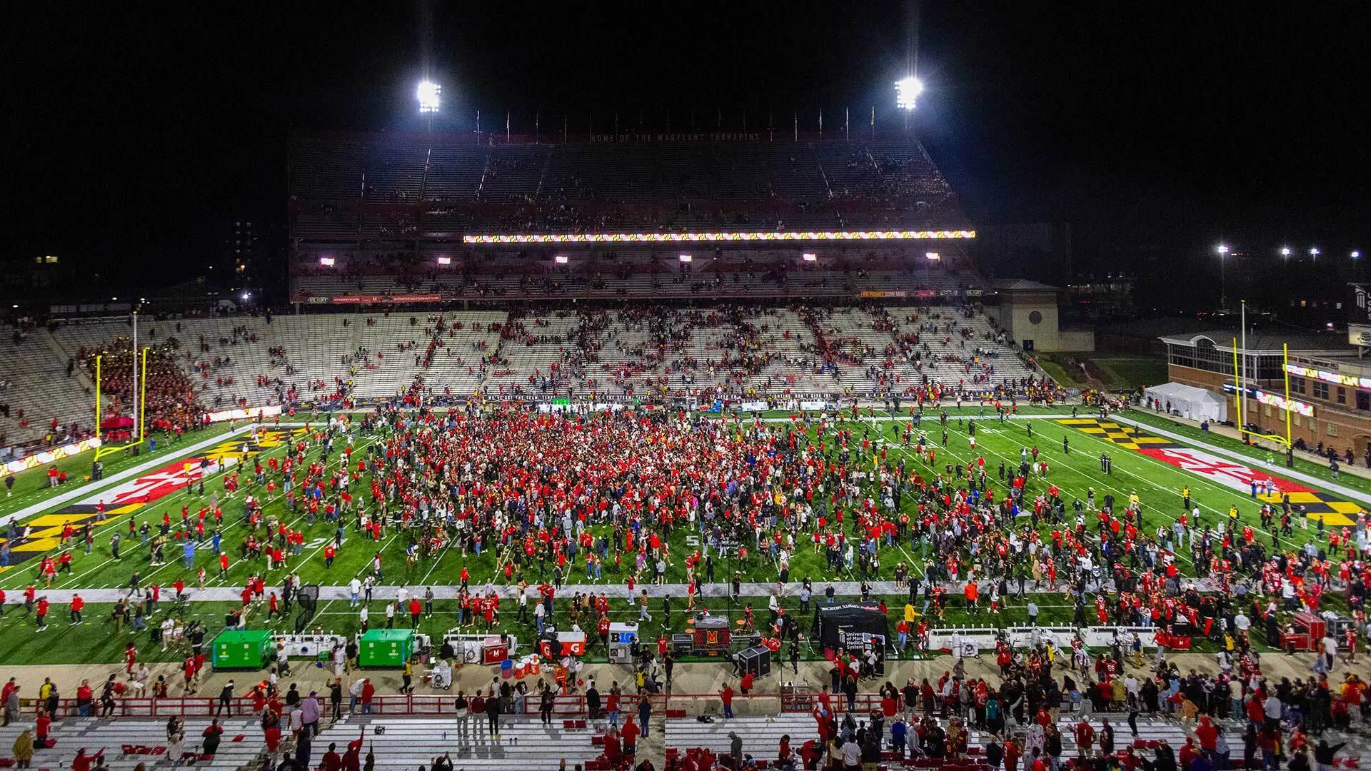 football stadium field full of fans