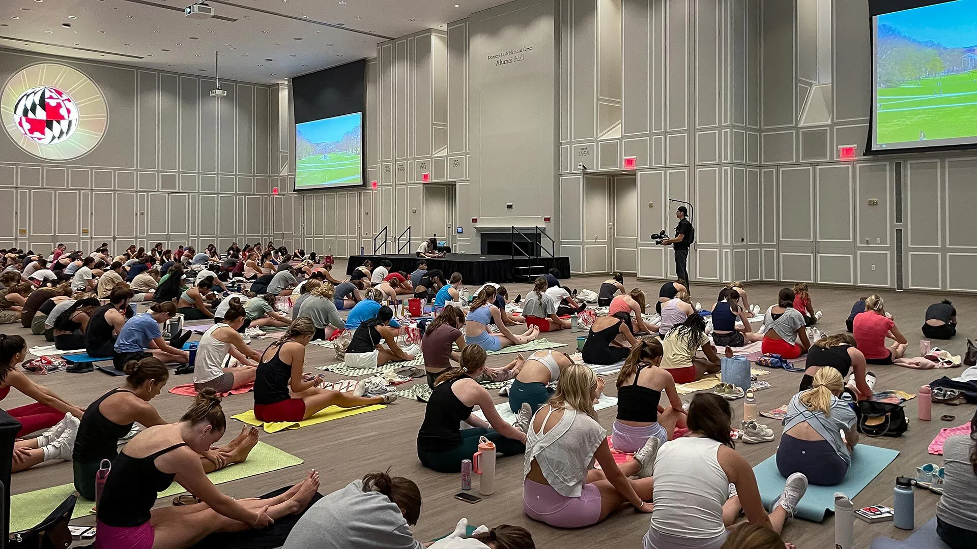 group does yoga in Riggs Alumni Center