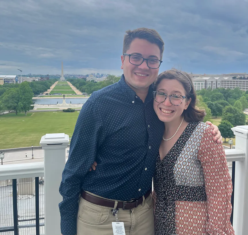 Logan Delavan-Hoover and Lauren Perl with the National Mall in the background