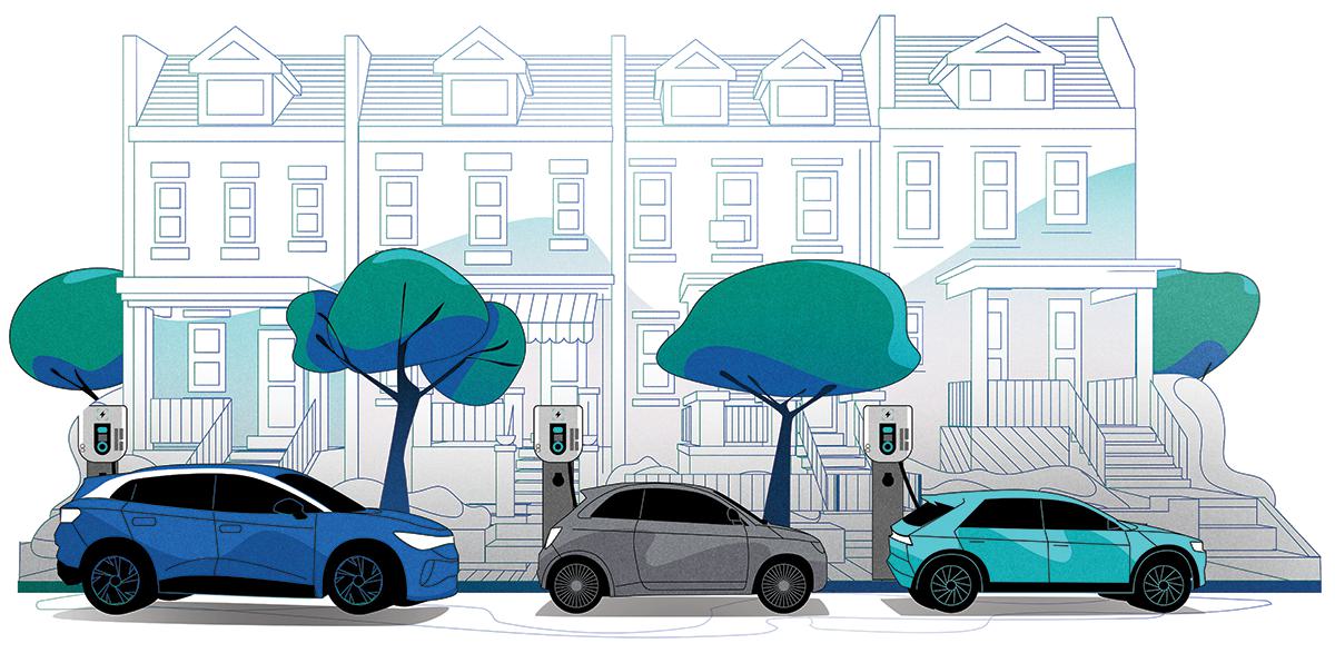 three cars parked near charging stations along street