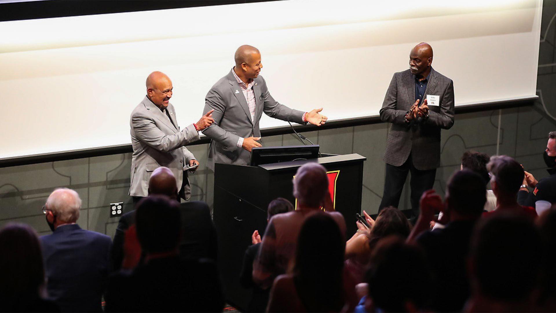 Darryl Hill, Damon Evans and Billy Jones on stage