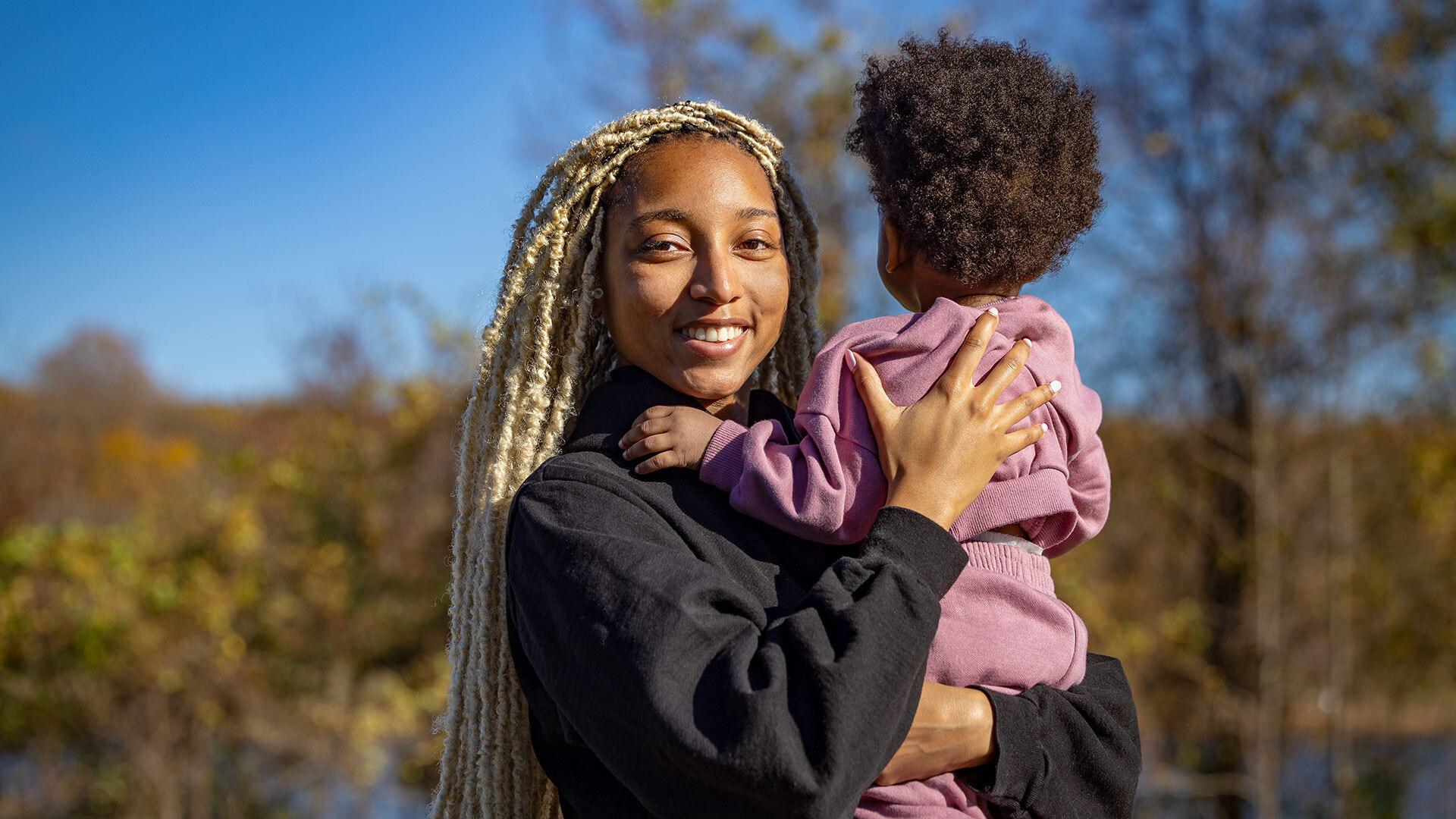 Amaya Johnson holds daughter