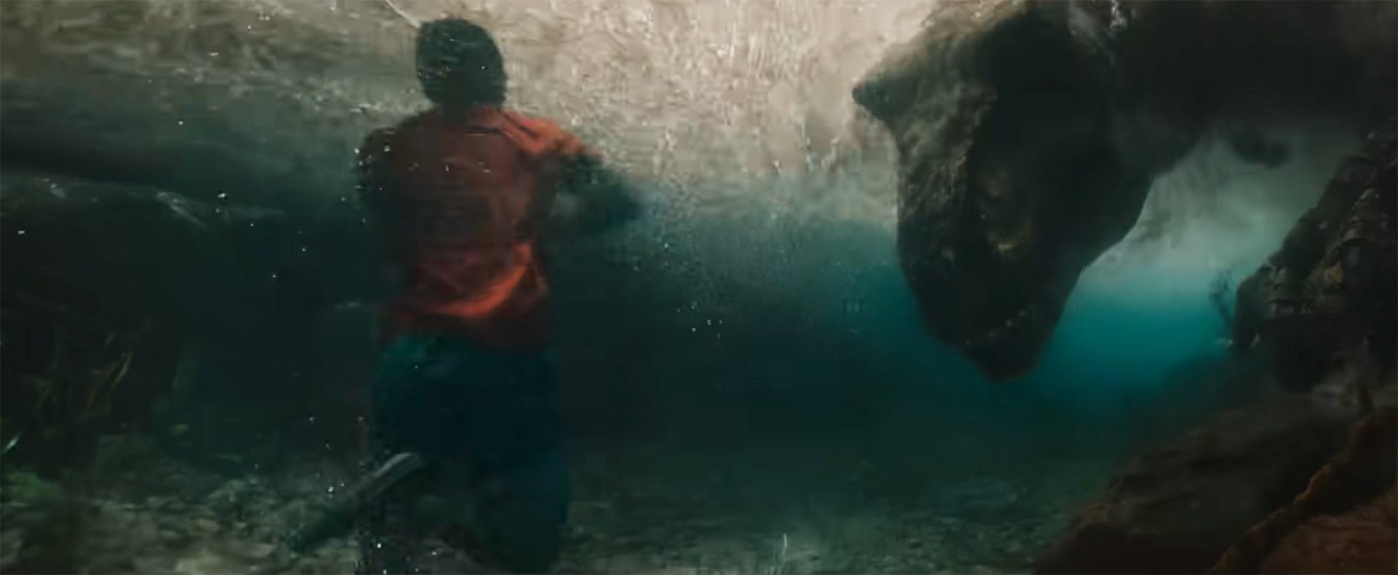T. rex in a river chasing a person