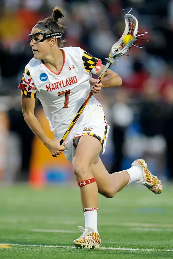 Katie Schwarzmann runs with lacrosse stick