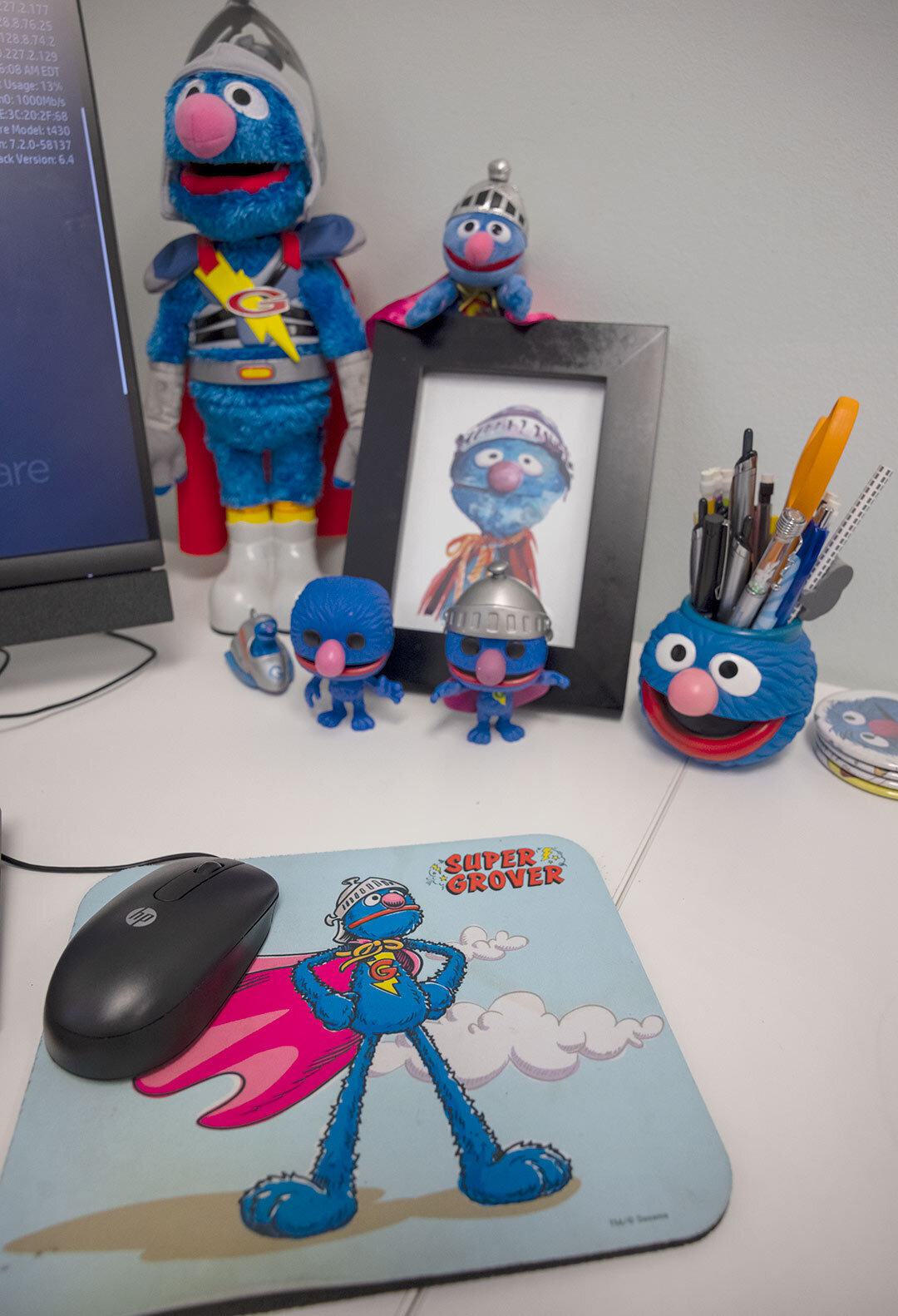 Grover figurines in office