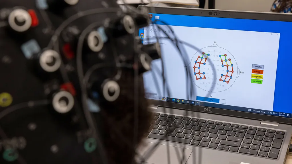 neuroimaging cap connected to a laptop