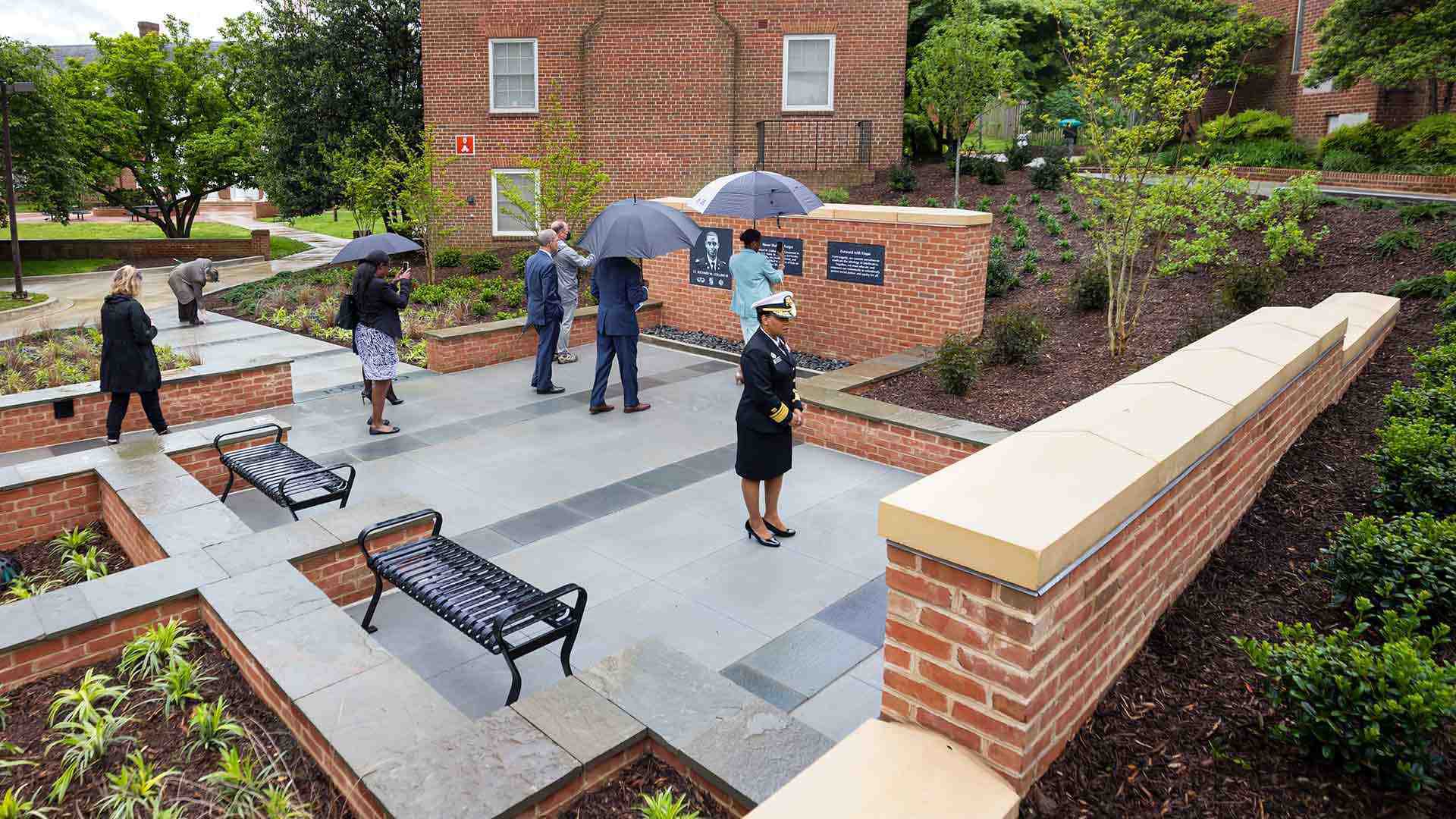 Community members view Lt Collins Plaza