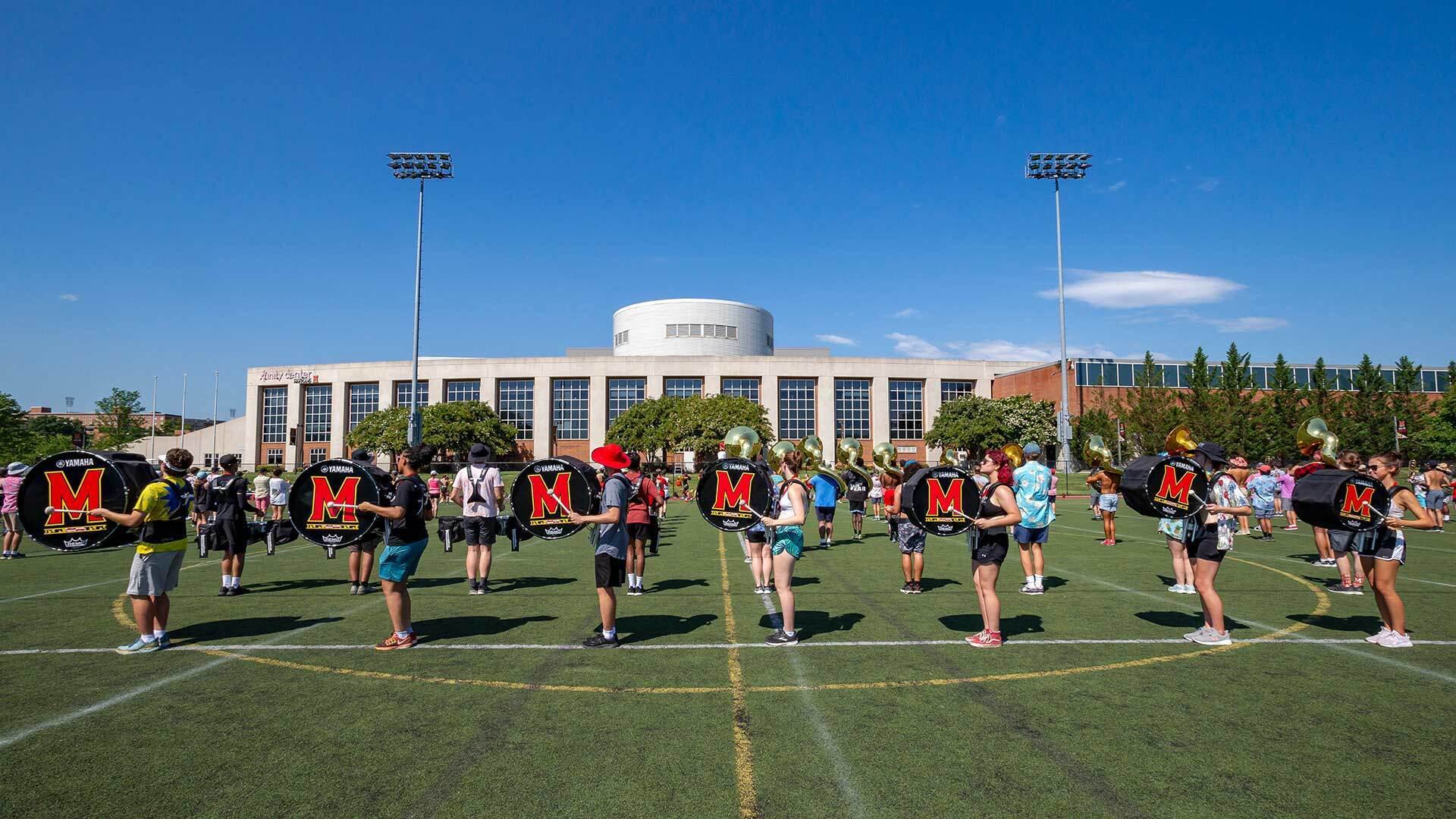 UMD marching band practices outside jones-hill house