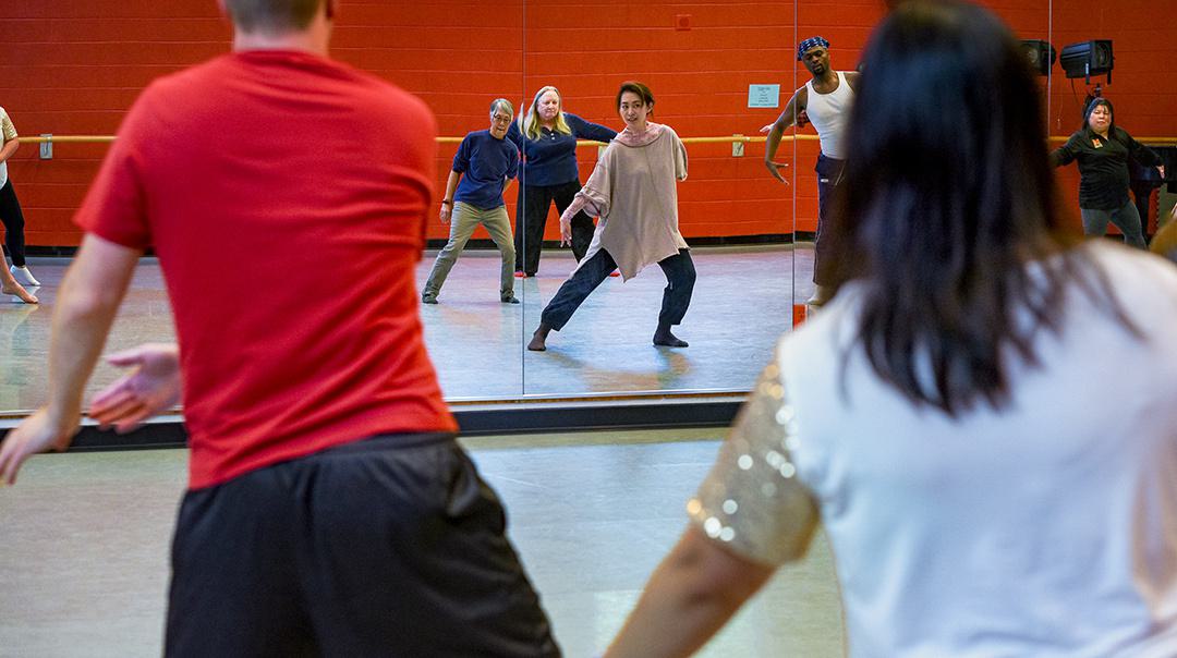people dance in a room