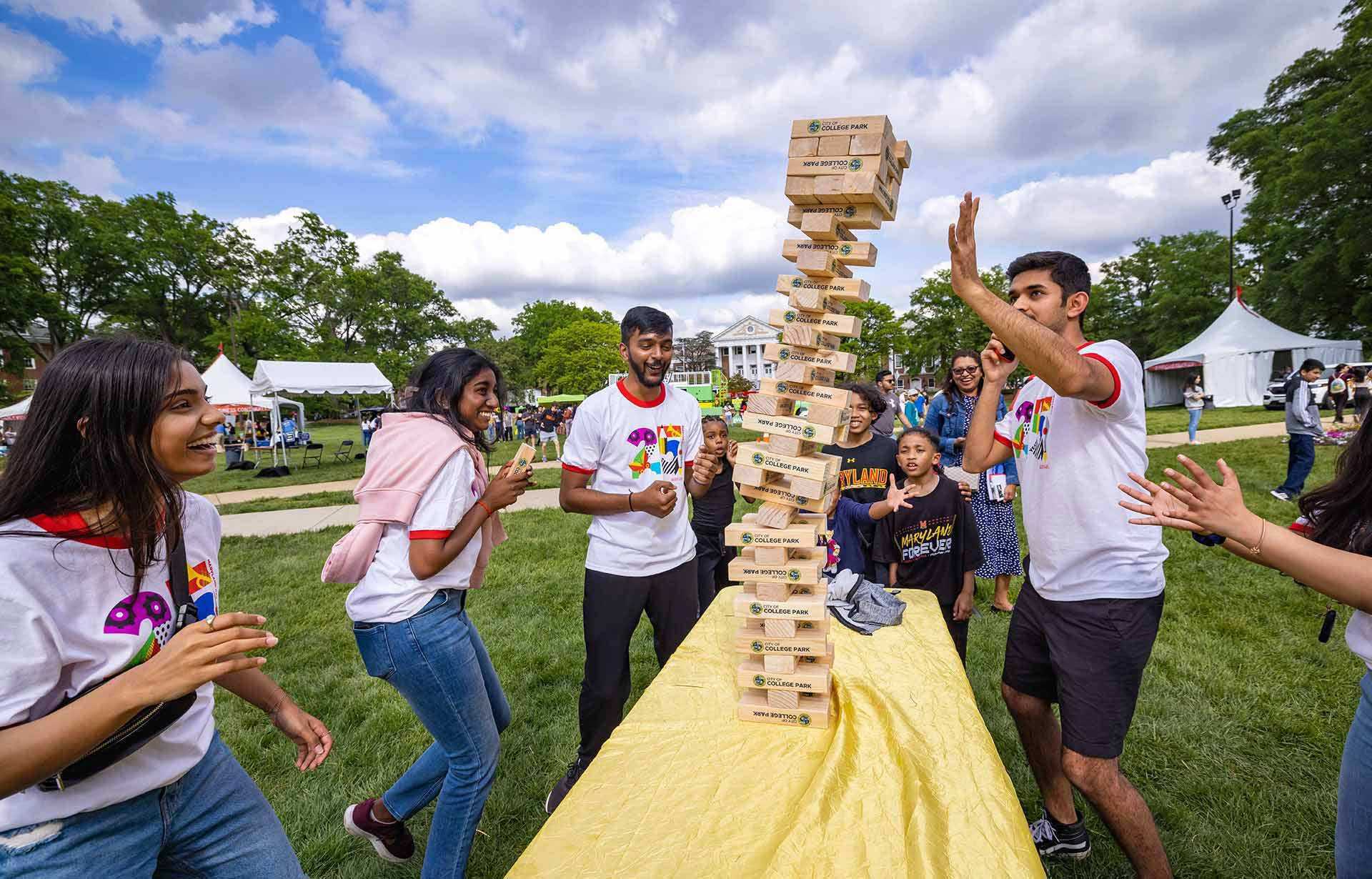 guets play giant Jenga