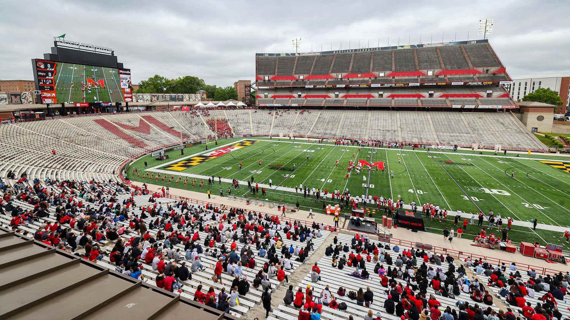 fans watch football game at SECU Stadium