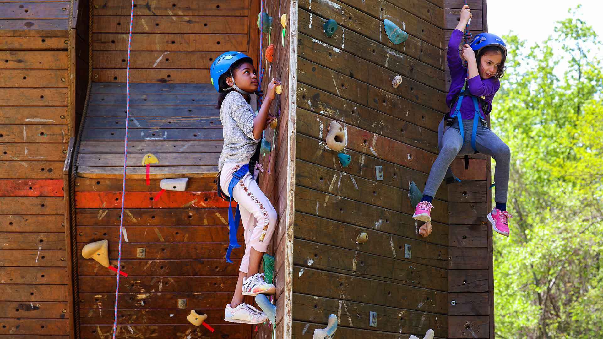 Two visitors on Eppley climbing wall