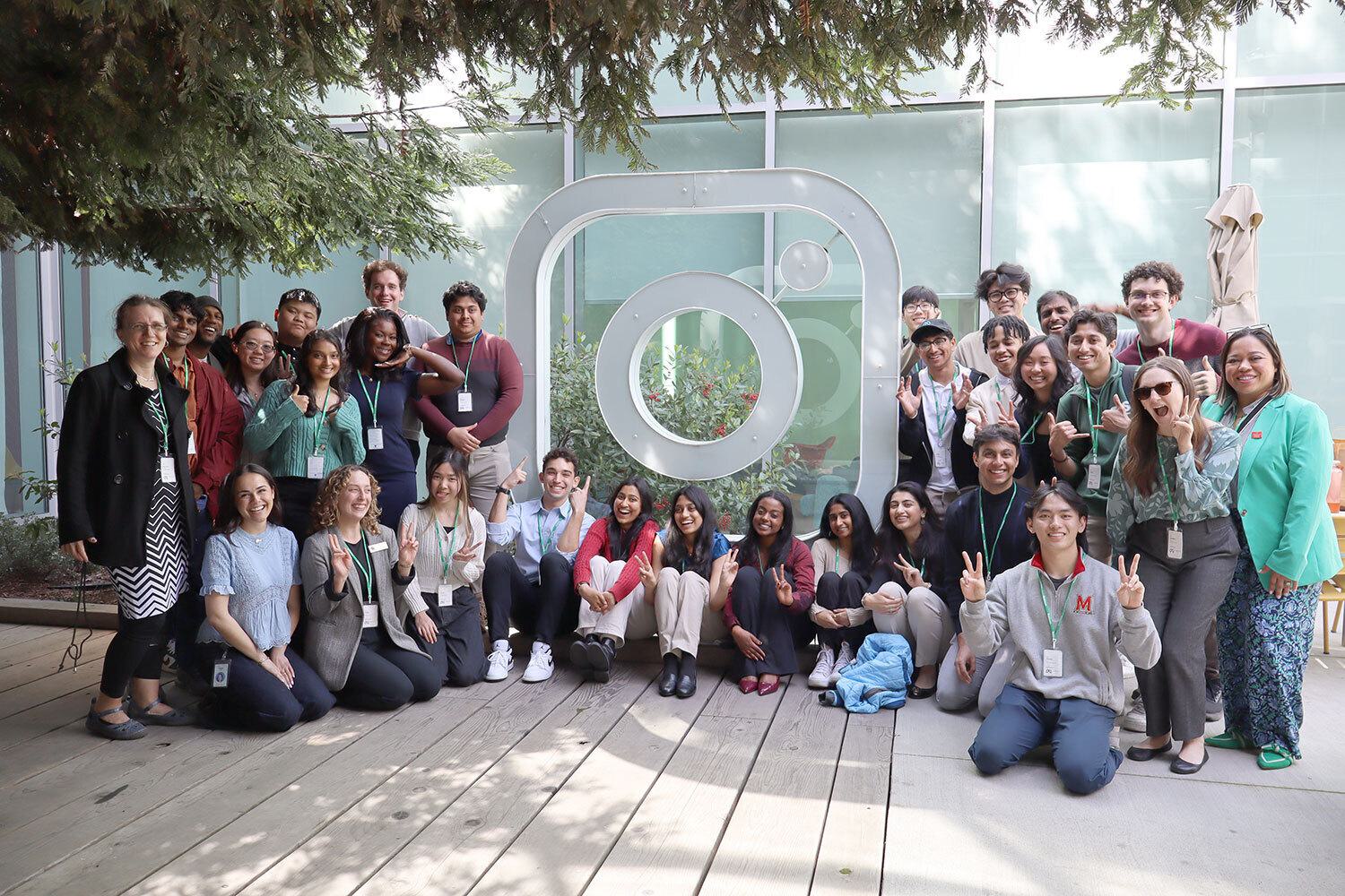 Group of students posing with Instagram logo