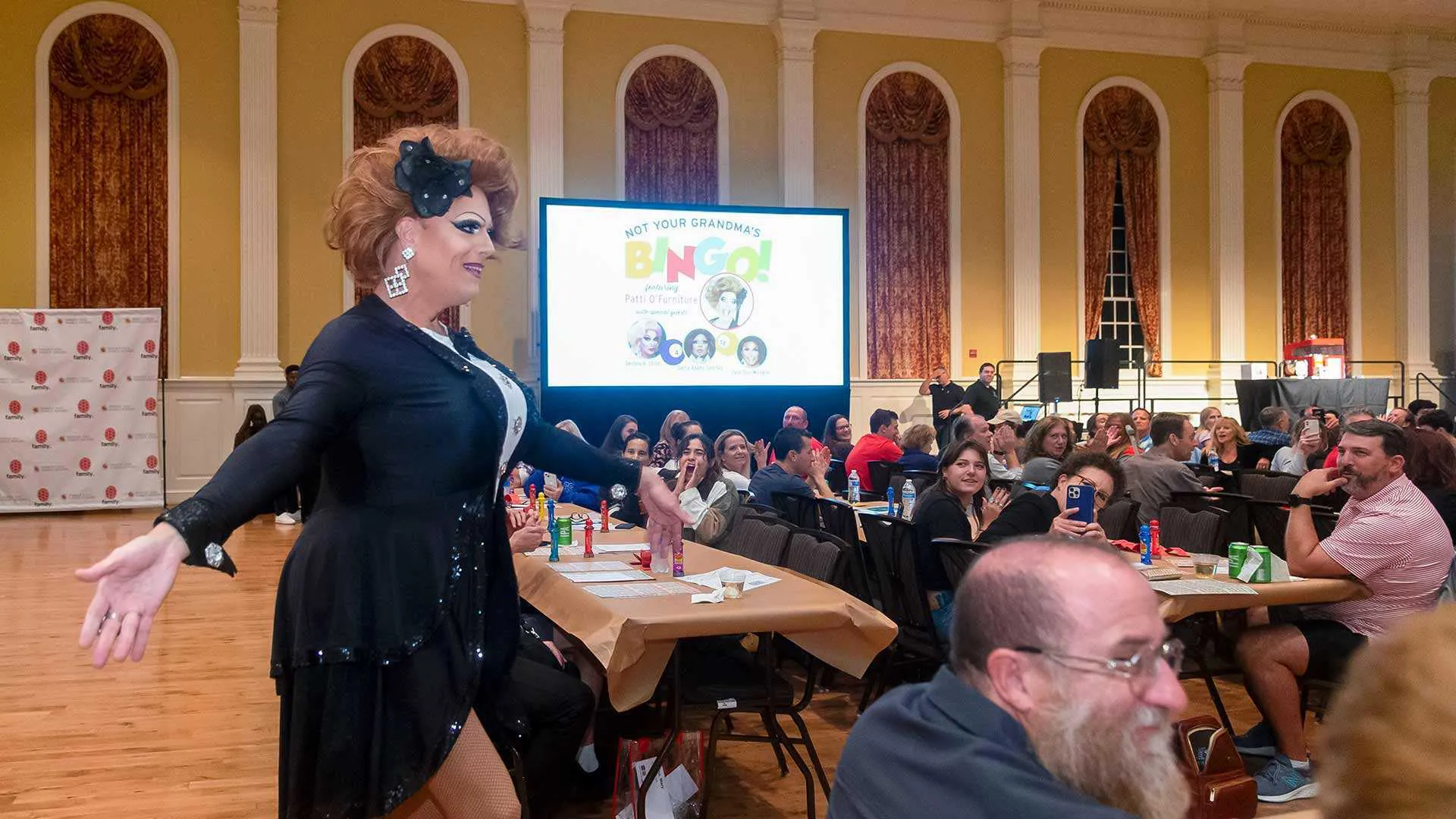 Drag queen runs bingo game at Stamp