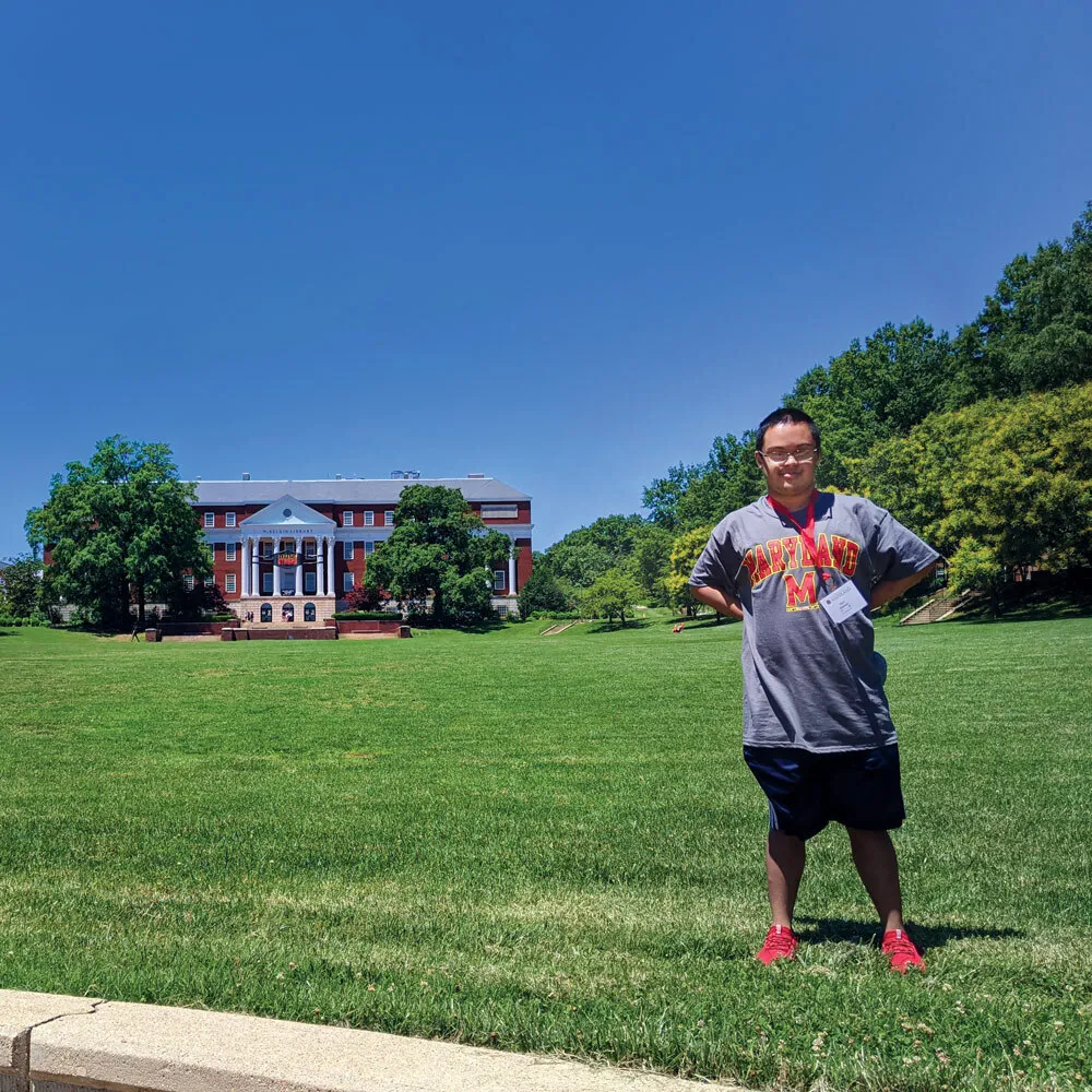 Student stands on McKeldin Mall