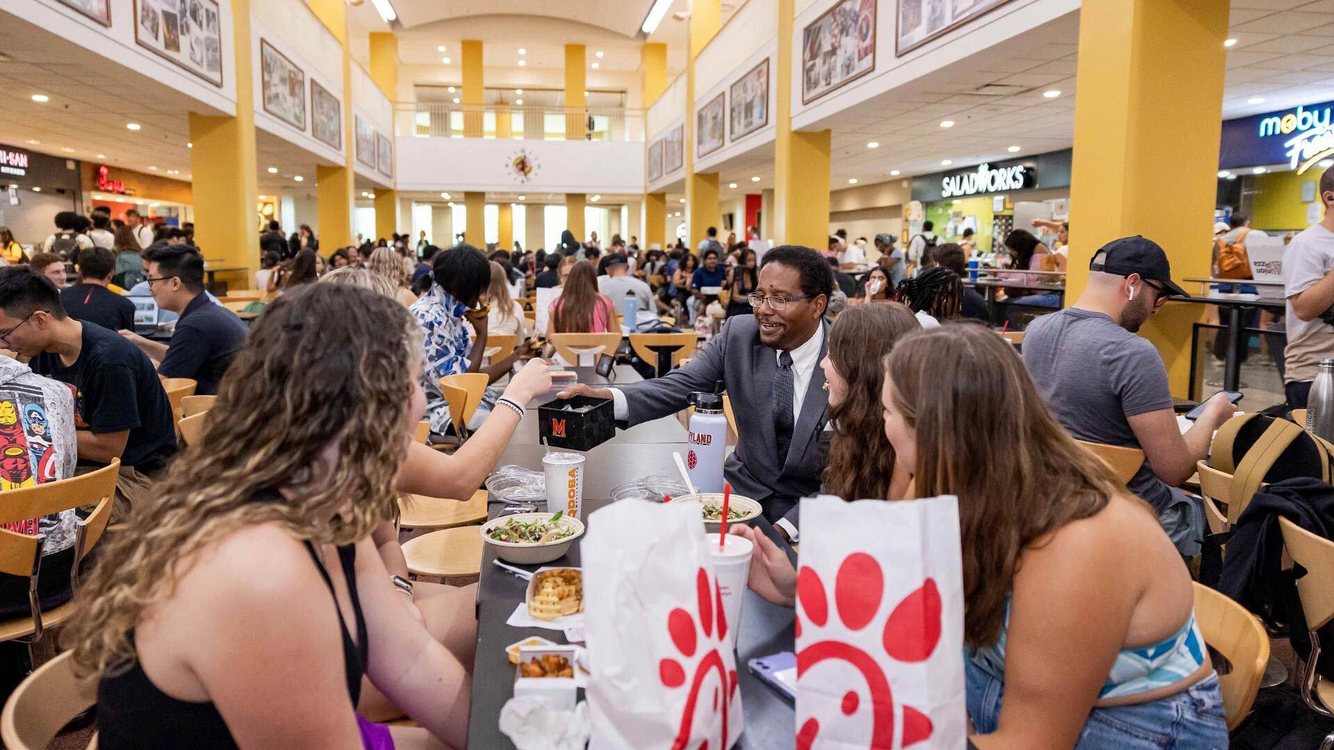 Pines talks to students at Stamp food court