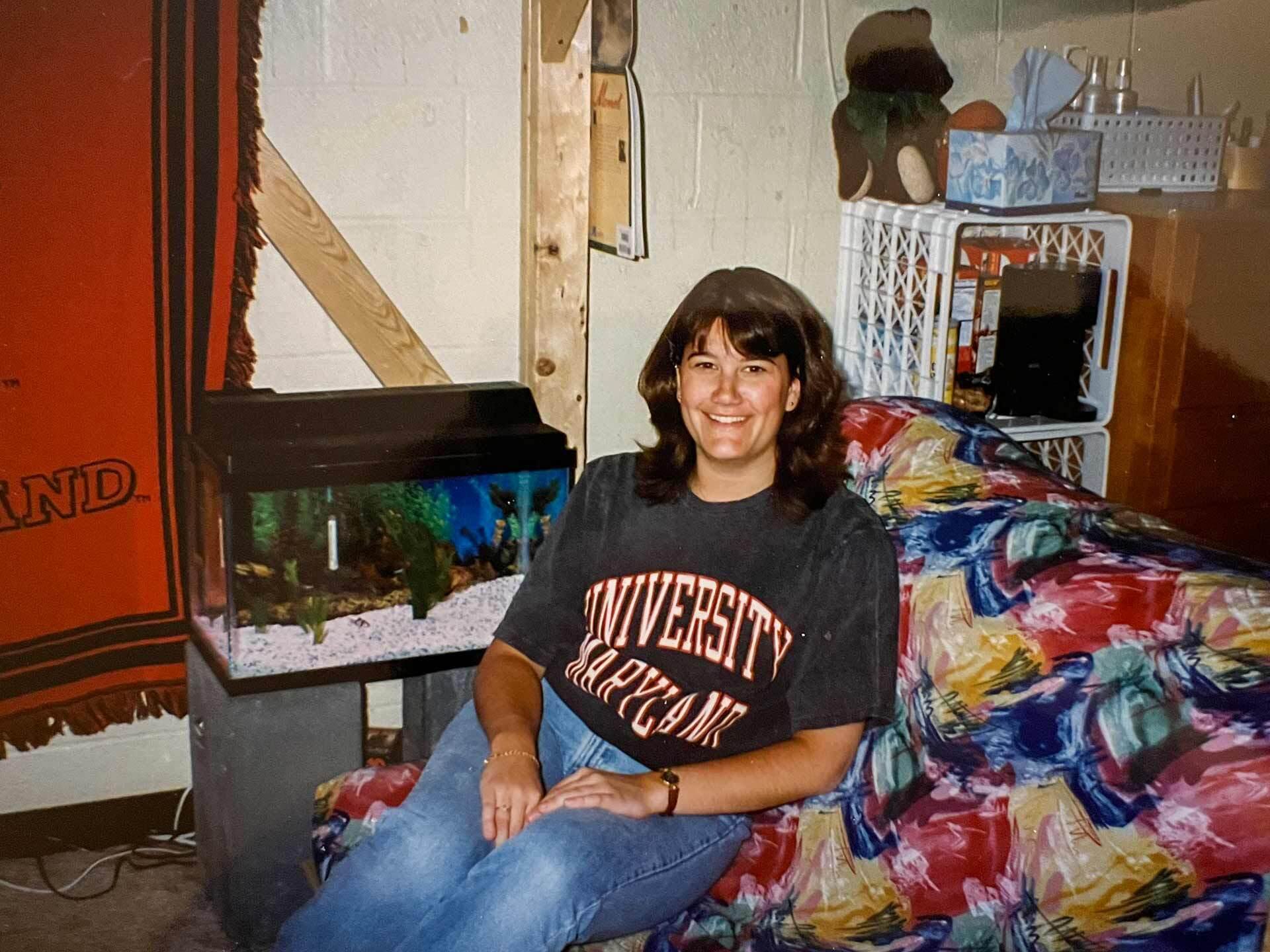 Gretchen Ricks in a University of Maryland t-shirt in her dorm room in the 1980s