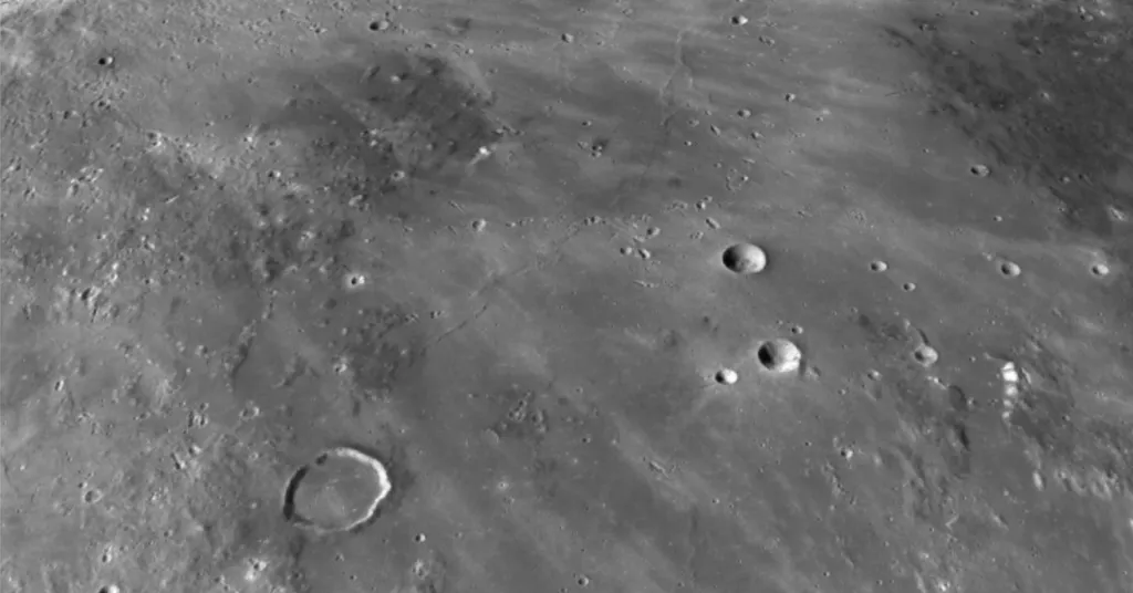 photo of craters on surface of moon