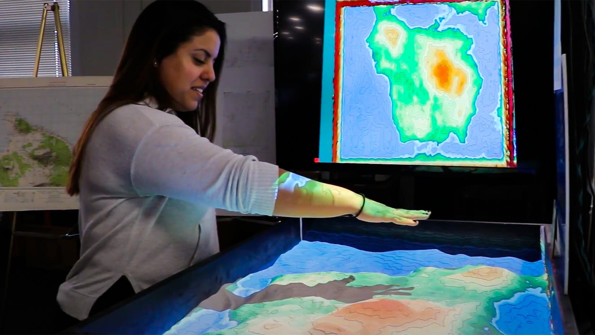 Person works with computer mapping in STEM lab