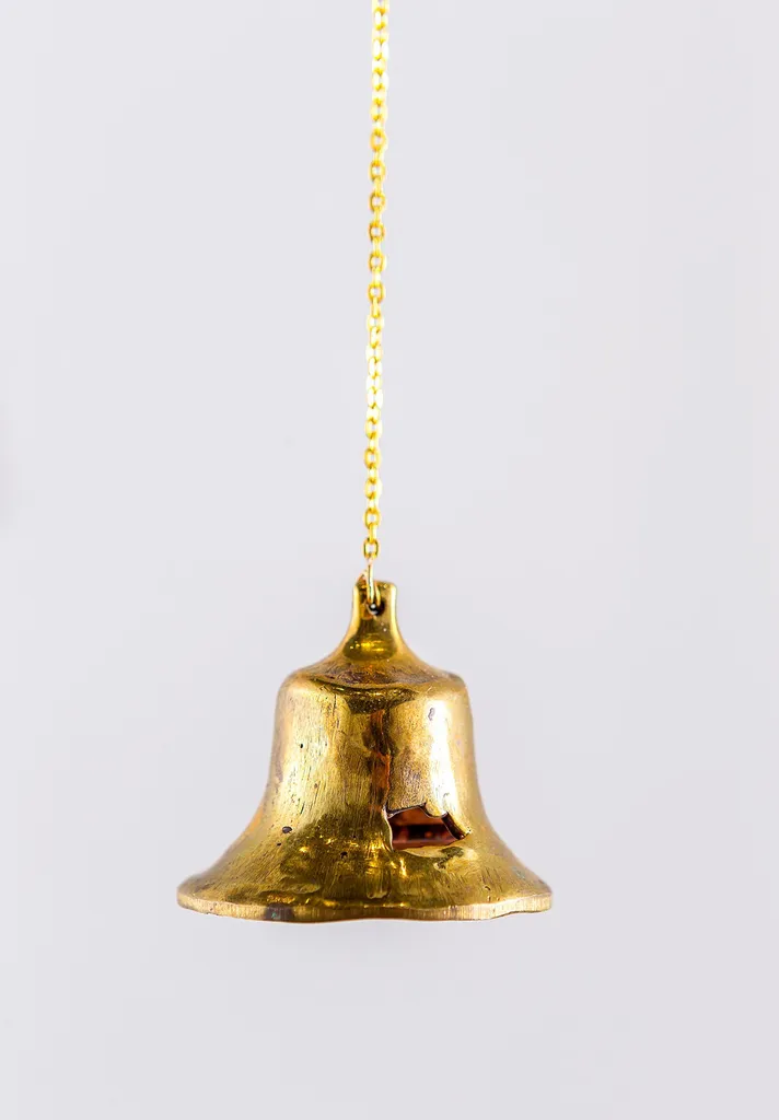 bell cast from melted bullet casings