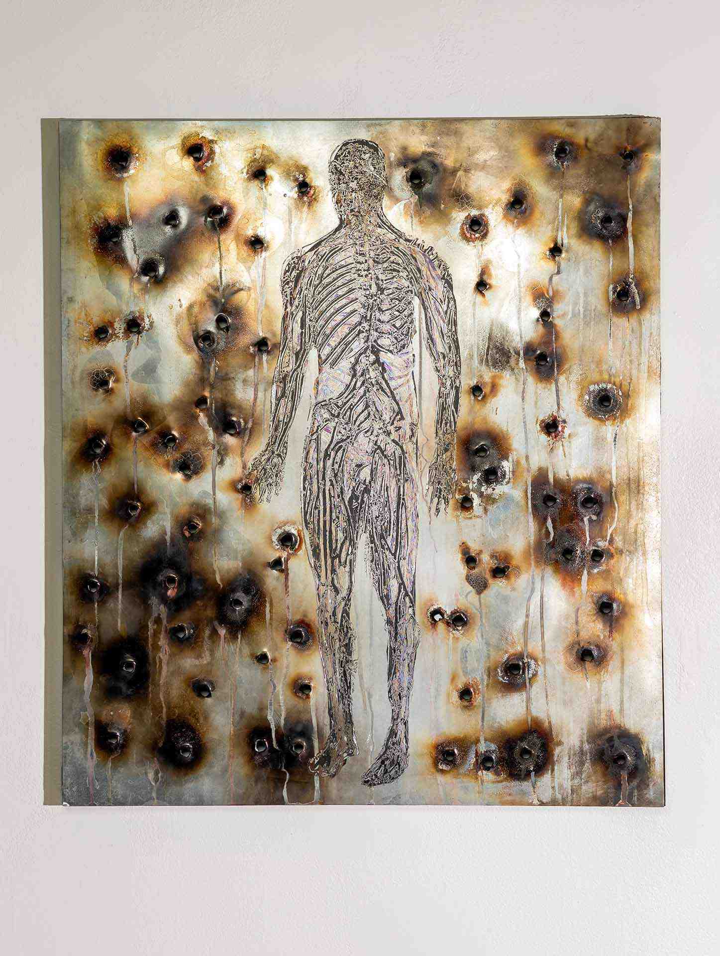 A nervous system made of gun components on a field of bullet-riddled steel