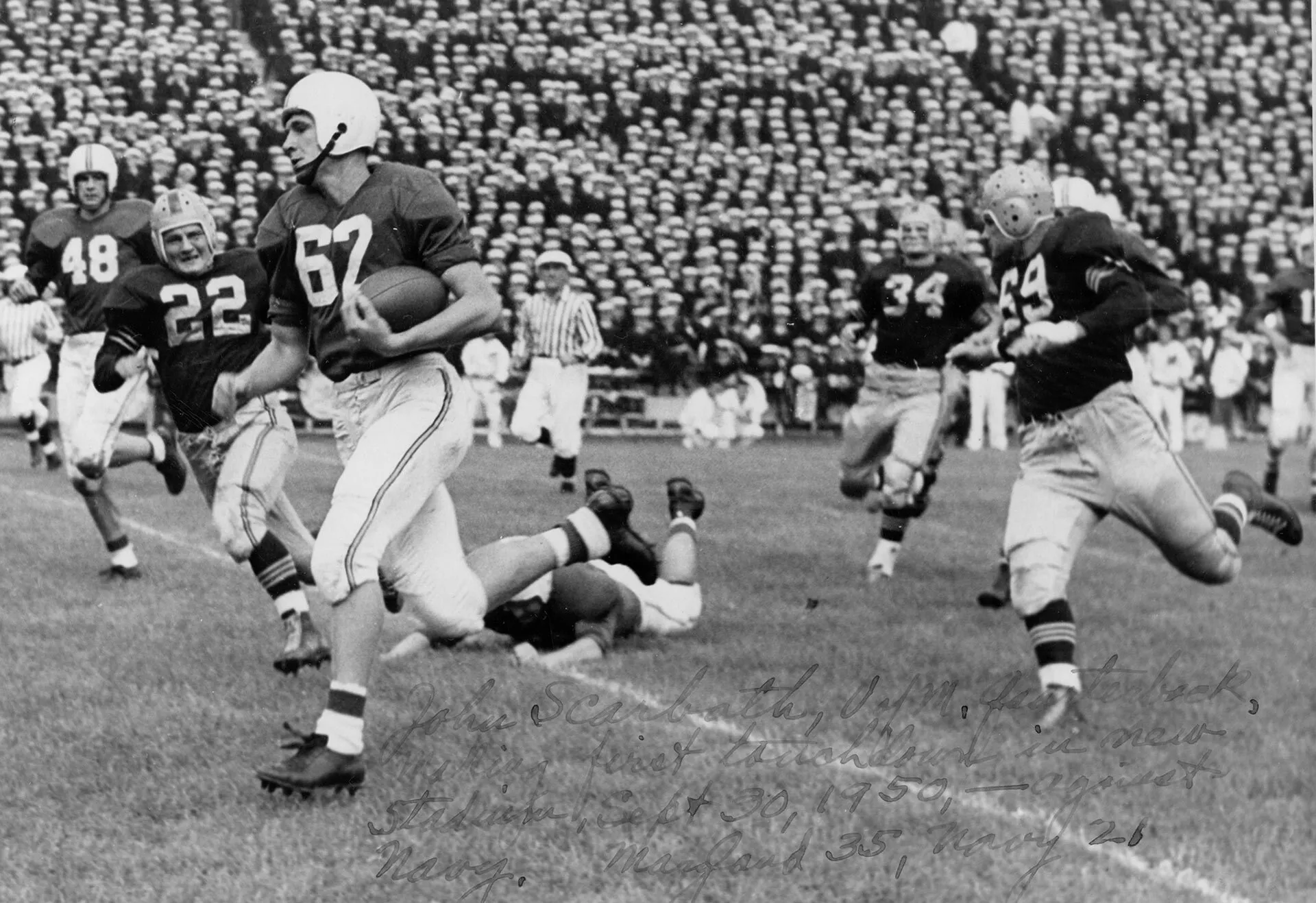 quarterback Jack Scarbath scores touchdown