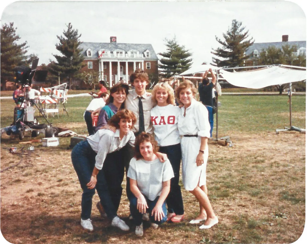 Andrew McCarthy surrounded by sorority girls on Fraternity Row