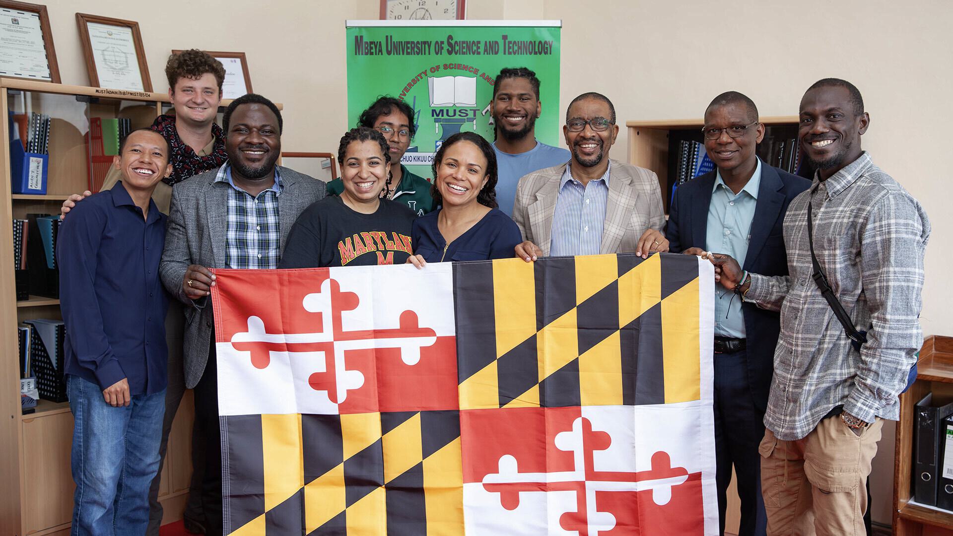 group holds Maryland flag