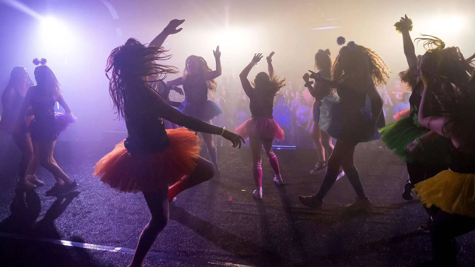 people dance wildly