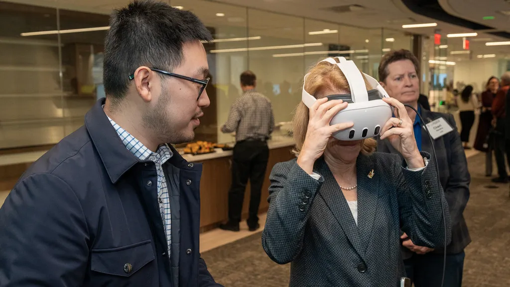 Person puts on VR headset