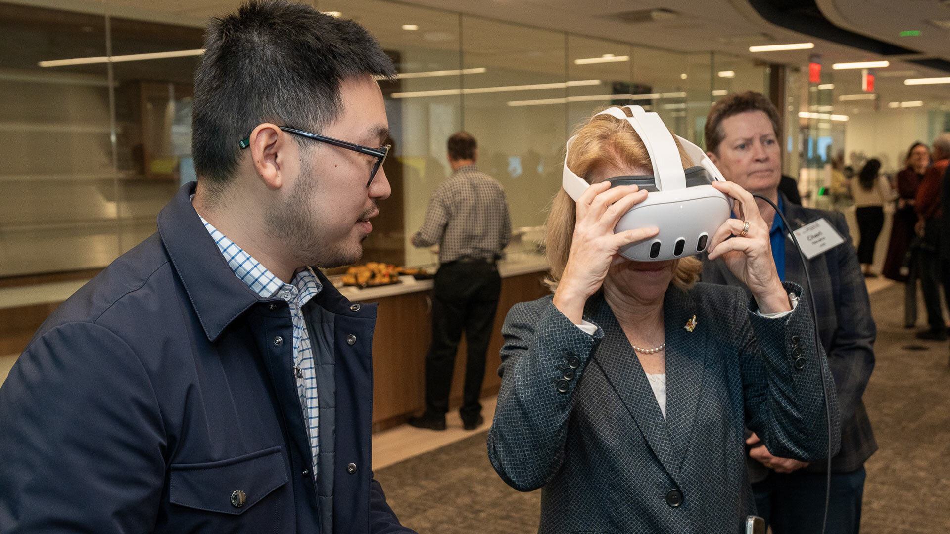 Person puts on VR headset