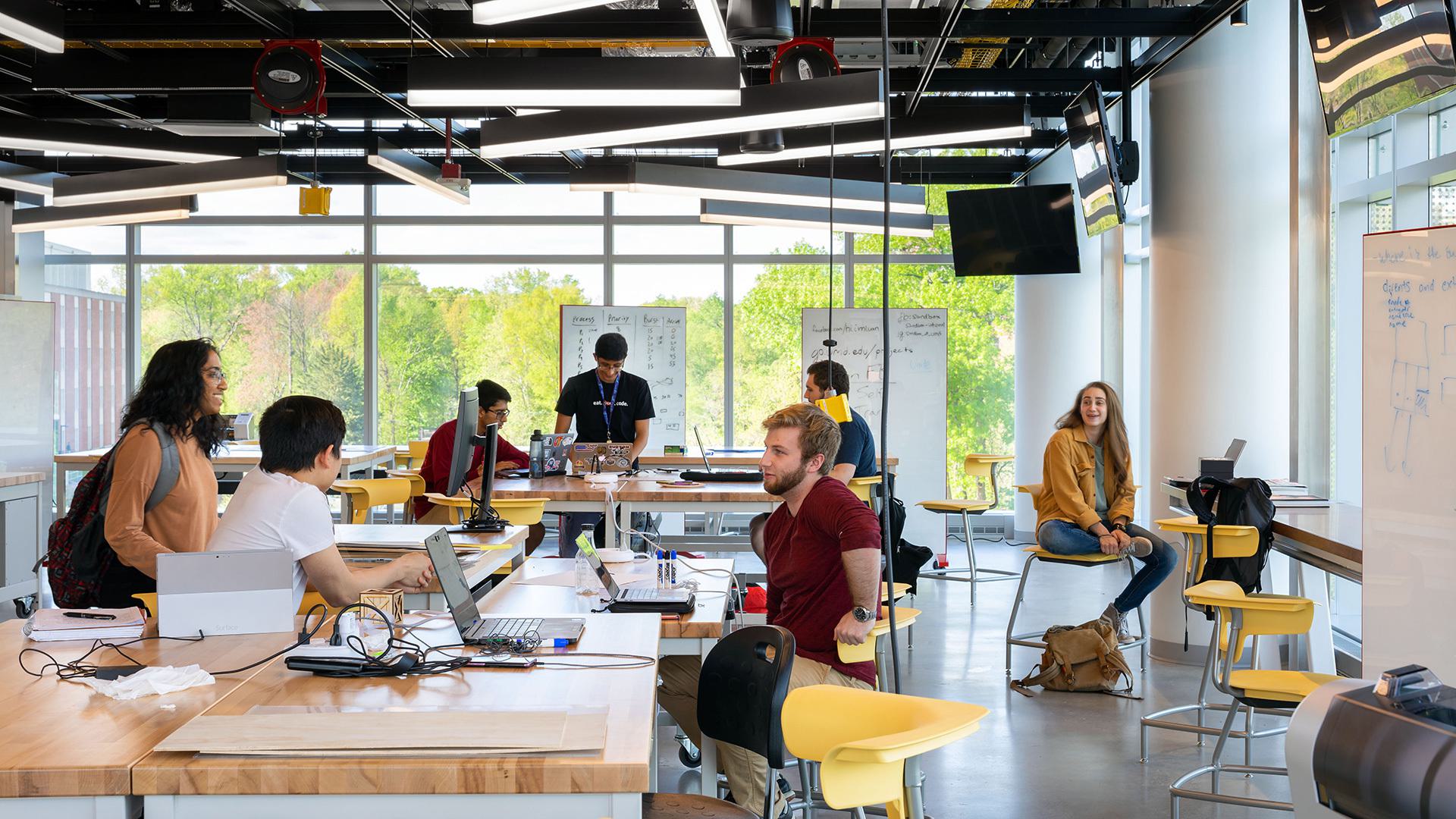 Students working in the Singh Sandbox facility