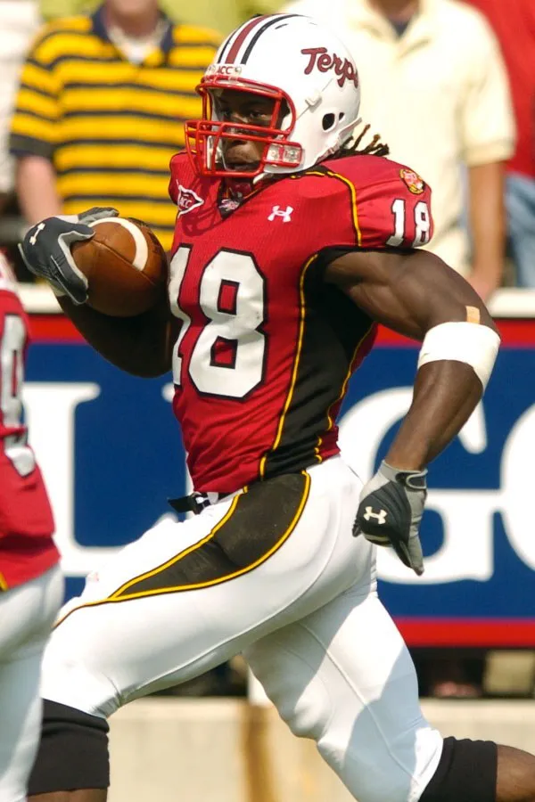 Football player running with a ball