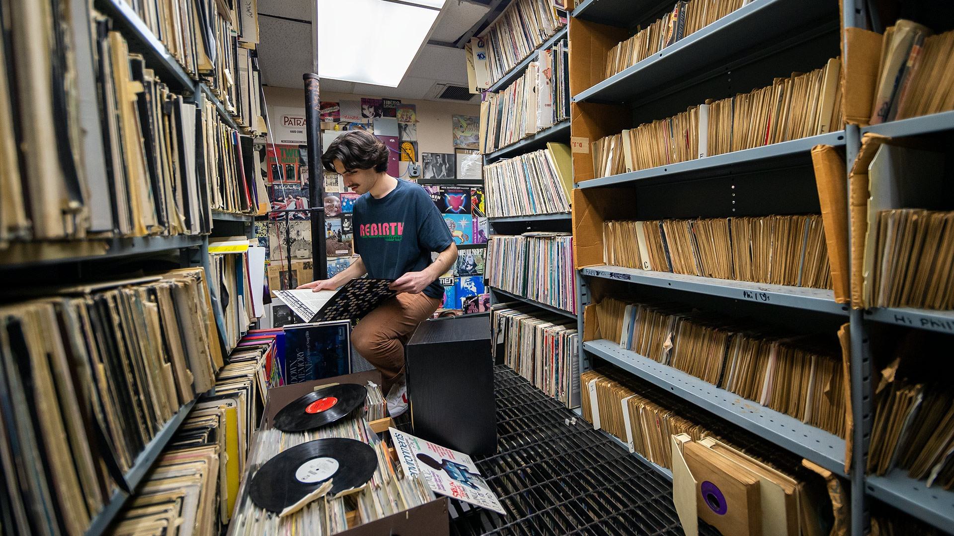 students looks at records