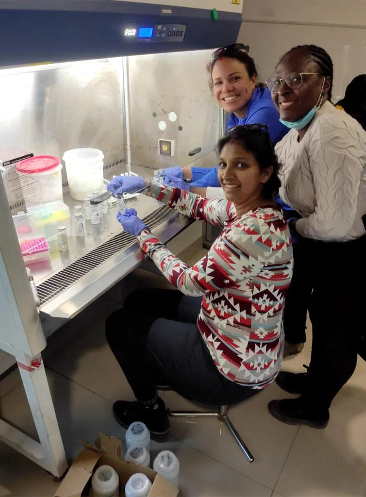 three people test water quality