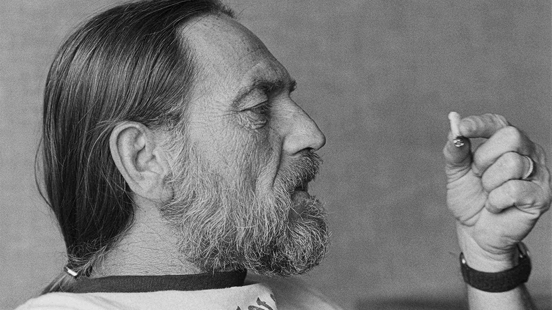 Willie Nelson holds joint