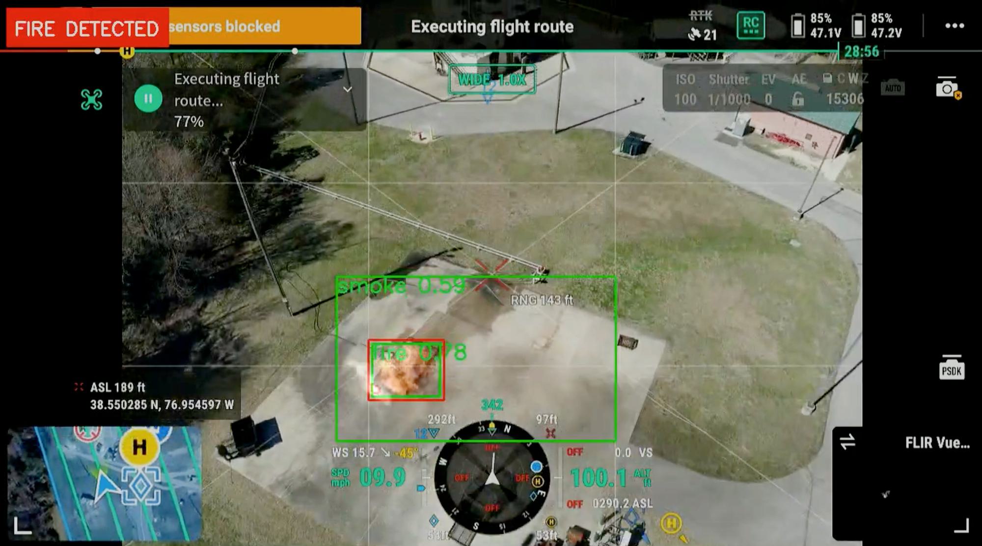 aerial camera footage showing "FIRE DETECTED"