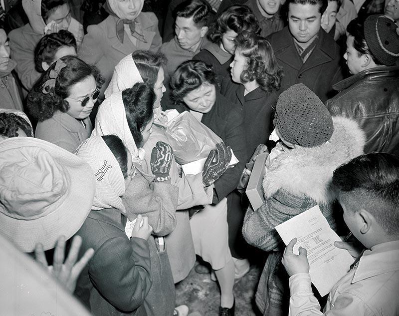 Prisoners in the Tule Lake Relocation Center in California say goodbye to people being transferred and granted leave