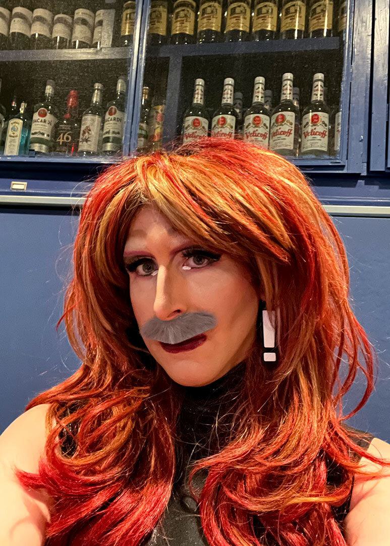 Kevin Belle as "Alexa Trebek"