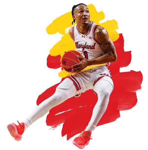 men's basketball player holds ball