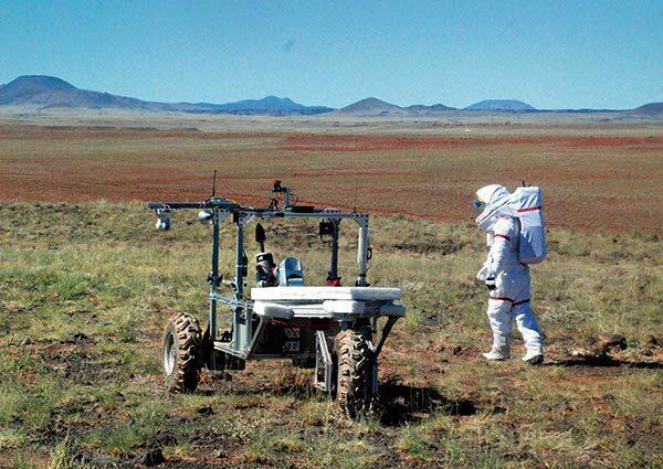 student tests rover in desert