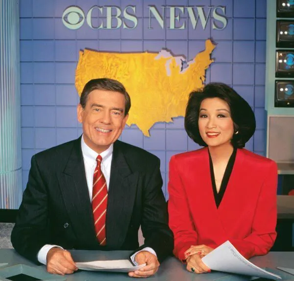 Chung with co-anchor Dan Rather